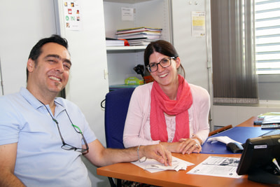 Migrol Mann und Frau in Besprechung Migrol Mann und Frau in Besprechung